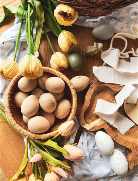 Wooden eggs in basket