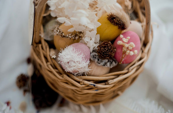 Wooden eggs in basket